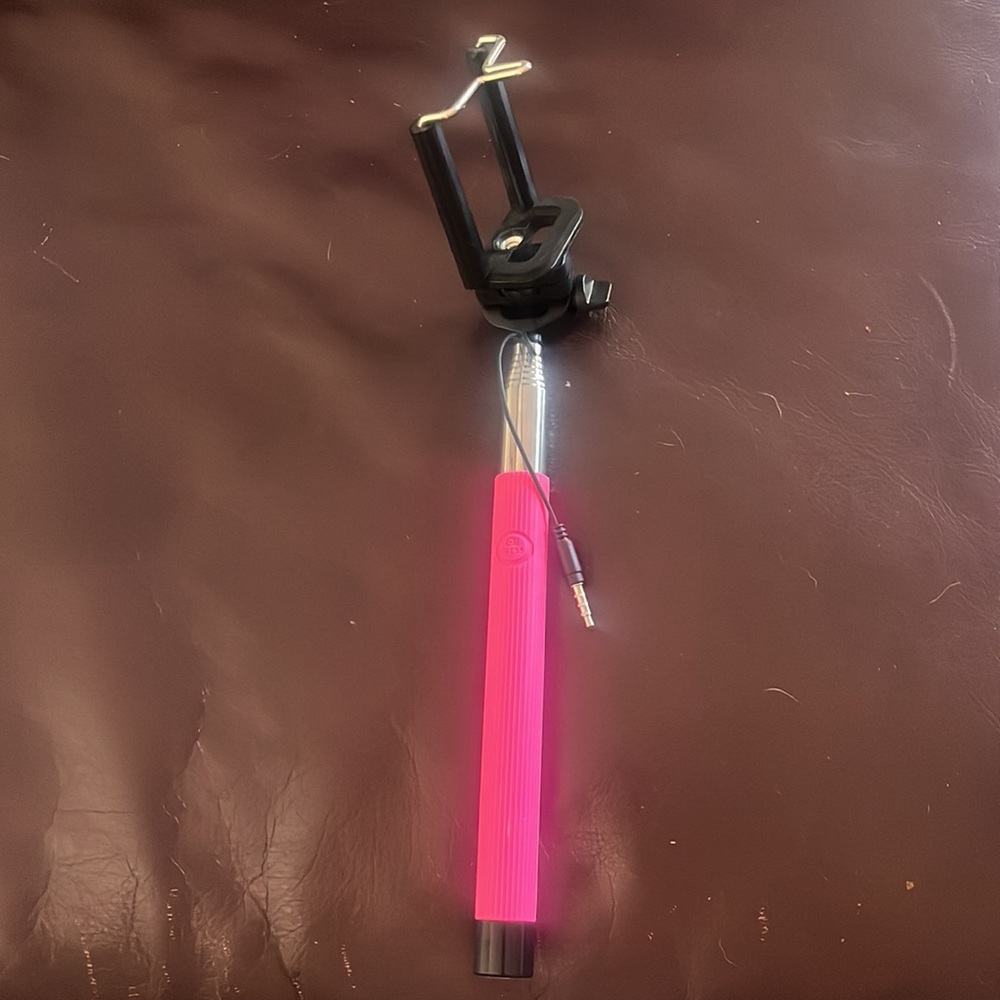 Lightweight Selfie Stick w/3.5mm design, shutter control, & extends to 40''.